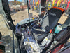 Kubota excavator cab interior showing operator seat and controls