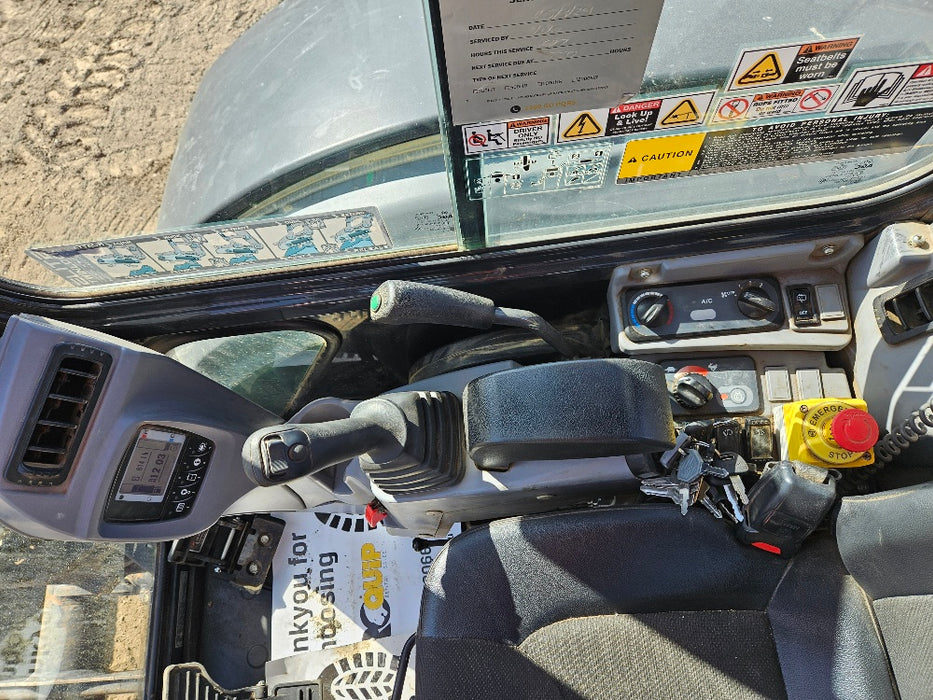 Kubota excavator operator controls and air conditioning panel