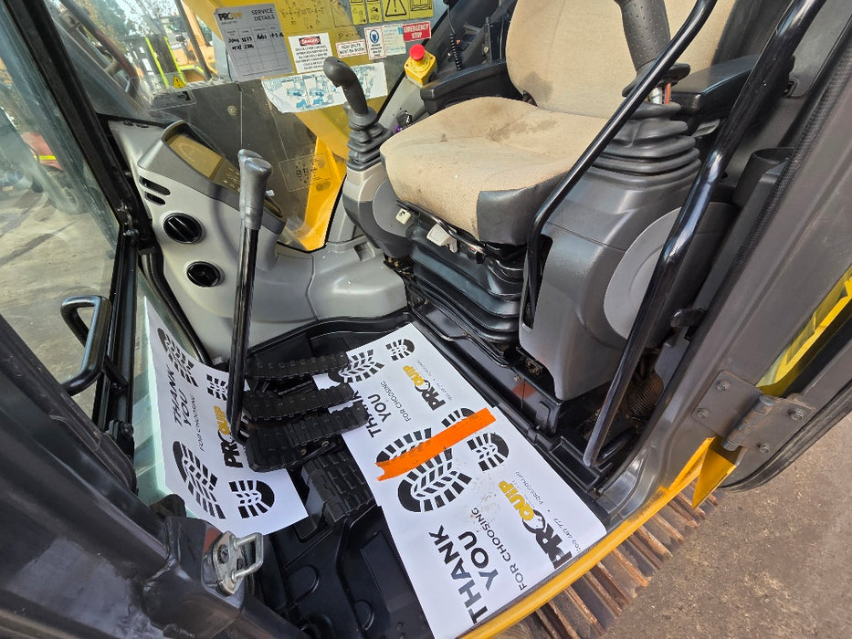 Excavator cabin with joystick controls