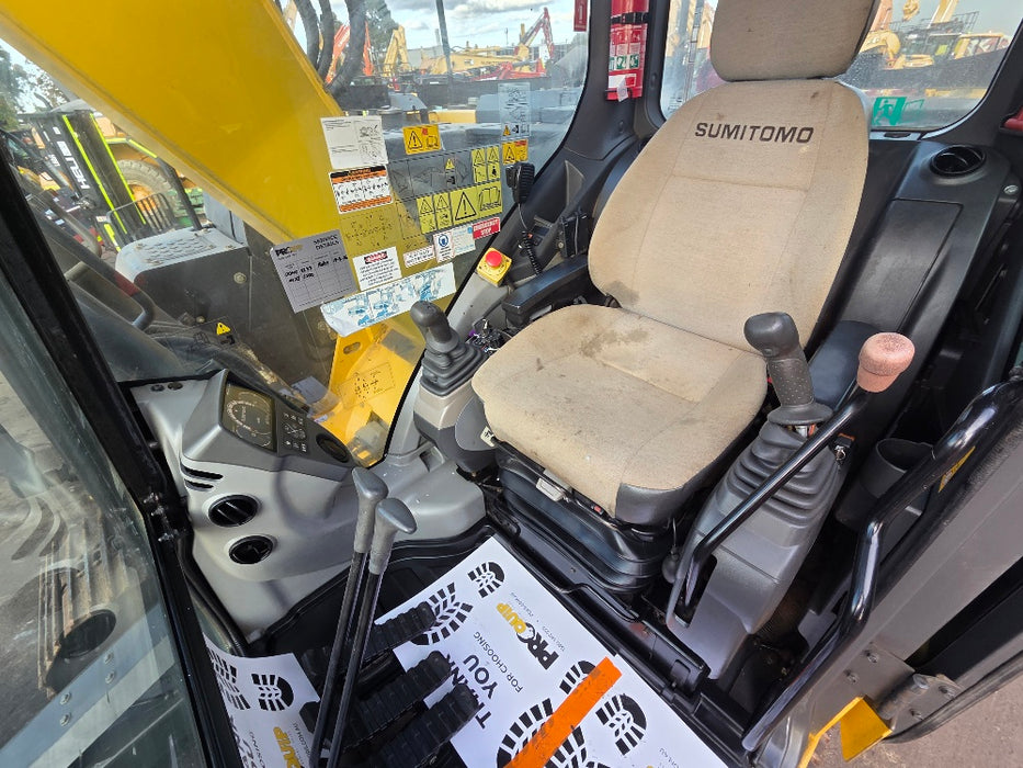 2019 Sumitomo SH145X-6 excavator featuring hydraulic quick hitch and dozer blade