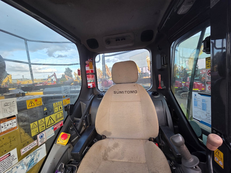 Rear view of 2019 Sumitomo SH145X-6 excavator showing counterweight and undercarriage