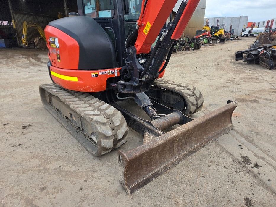 2022 Kubota U48-4 excavator showing buckets and attachments